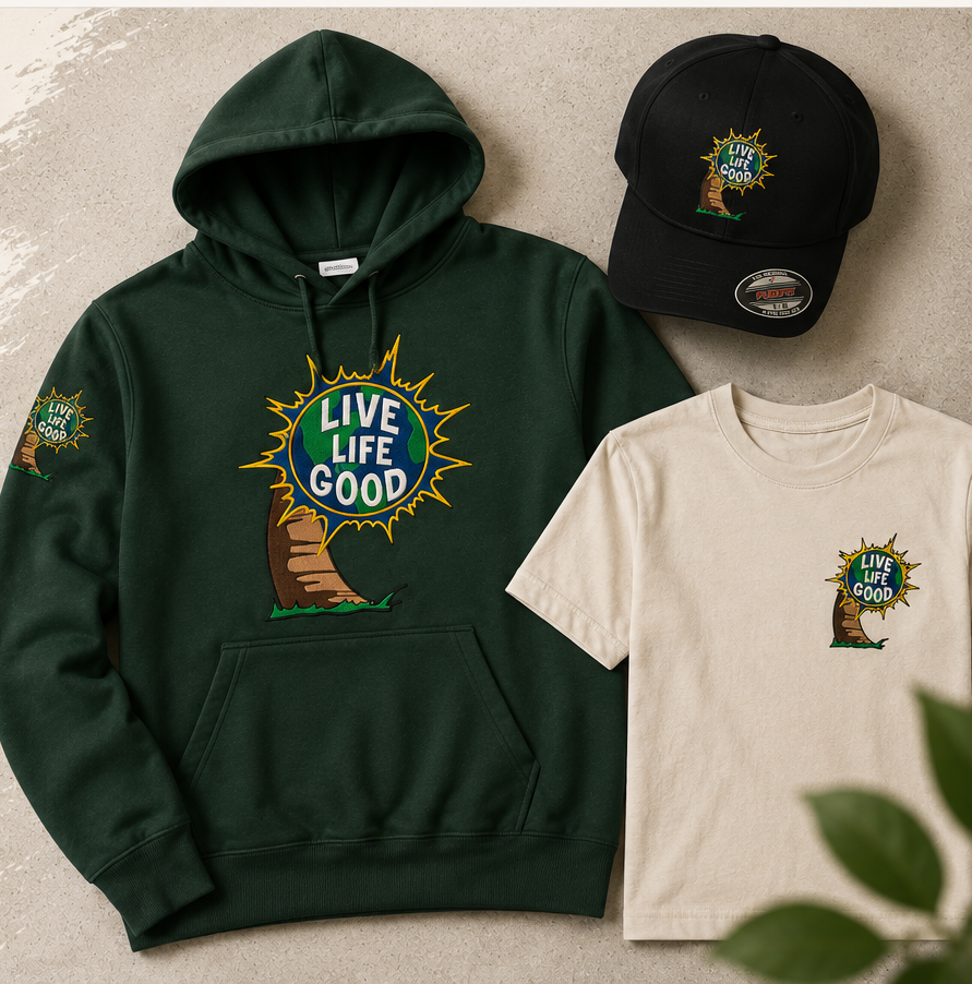 Live Life Good green embroidered hoodie, black Flexfit hat and cream embroidered t-shirt flat-lay